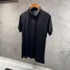 Burberry Siyah Kırmızı Çizgili Yakalı Tişört